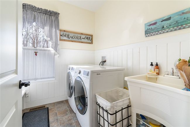 Convenient FIRST FLOOR laundry room- right off the garage too! | Image 24