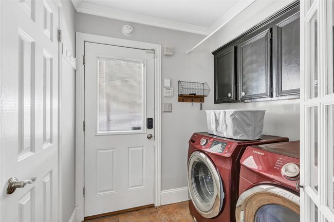 Spacious laundry area. | Image 28
