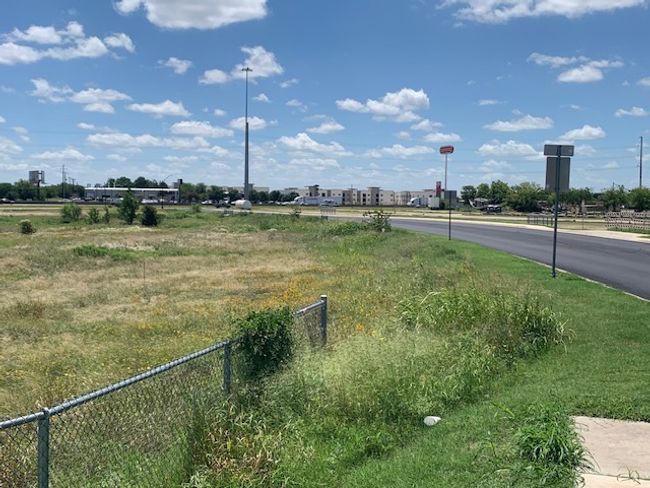 view of Marketplace Ave looking towards IH 35, 1 block from subject | Image 26