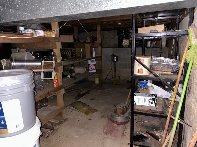 The 'canning' room in basement. Lots of shelves for jars, and more storage. And second sump pit. | Image 52