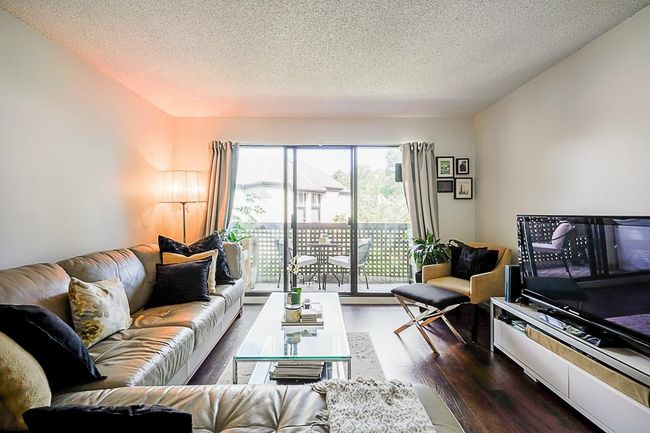 310 - 385 Ginger Drive, Condo with 2 bedrooms, 1 bathrooms and null parking in New Westminster BC | Image 1