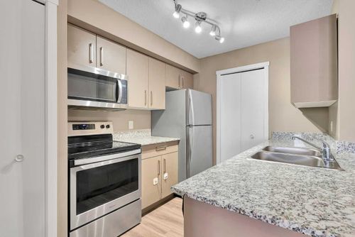 1205 - 4641 128 Avenue Ne, Home with 2 bedrooms, 2 bathrooms and 1 parking in Calgary AB | Card Image
