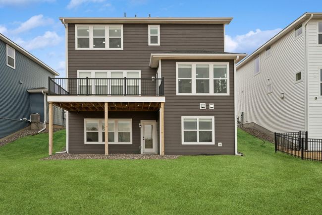 Well maintained backyard with sprinklers | Image 39