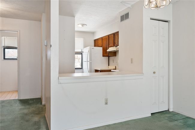 open pass through from dining area to kitchen | Image 7