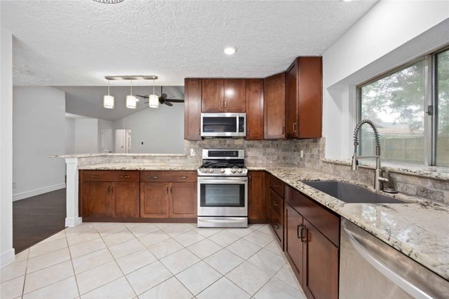 13514 Bridgepath Cv, House other with 3 bedrooms, 2 bathrooms and 2 parking in Houston TX | Image 12