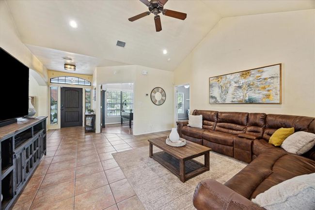 The open concept still has great separation between the rooms. This large family room sees it all. | Image 12