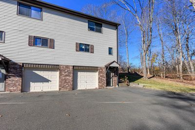 Three level unit with garage under and basement. | Image 1