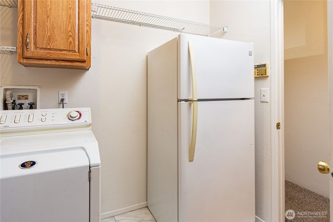 Laundry room. this extra fridge will convey | Image 21