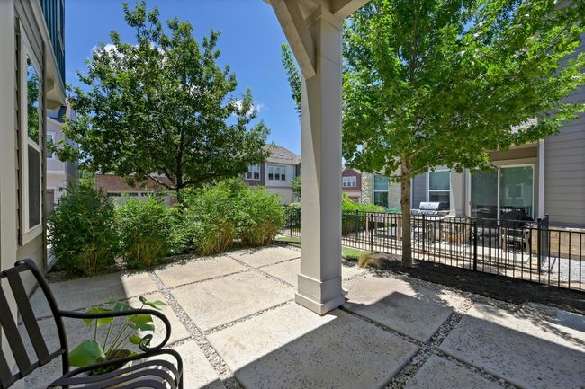 View of patio with a residential view | Image 5