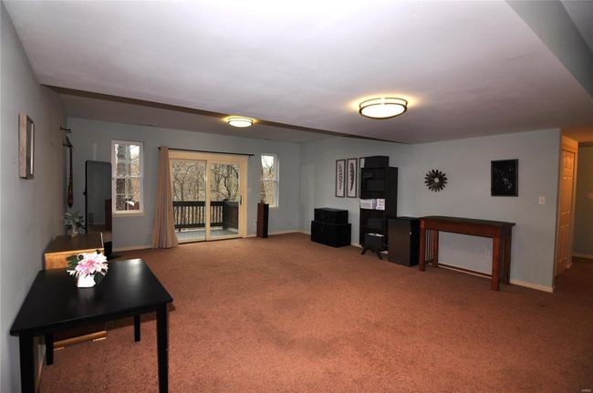 Opposite angle of basement family room/rec area. | Image 26