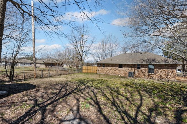 View of yard featuring fence | Image 5
