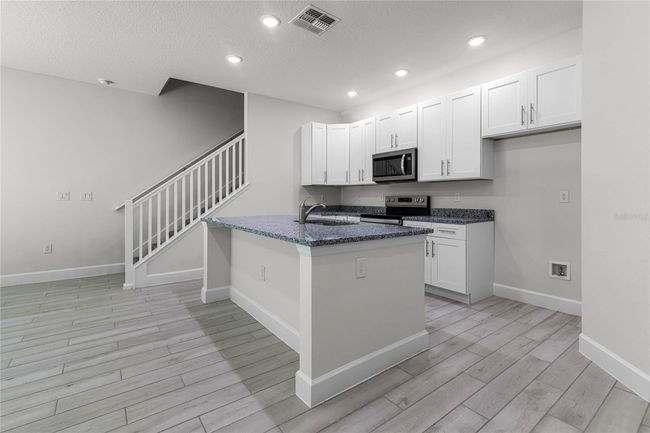 561 Coronado Cove Rd, Townhouse with 3 bedrooms, 3 bathrooms and null parking in New Smyrna Beach FL | Image 4