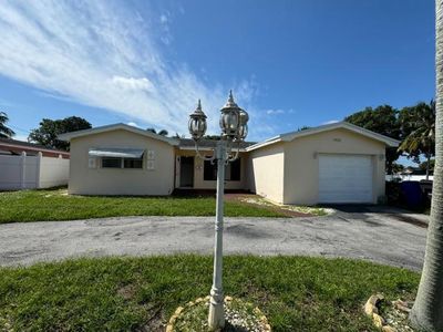 3498 Nw 32nd Court, House other with 3 bedrooms, 2 bathrooms and null parking in Lauderdale Lakes FL | Image 1