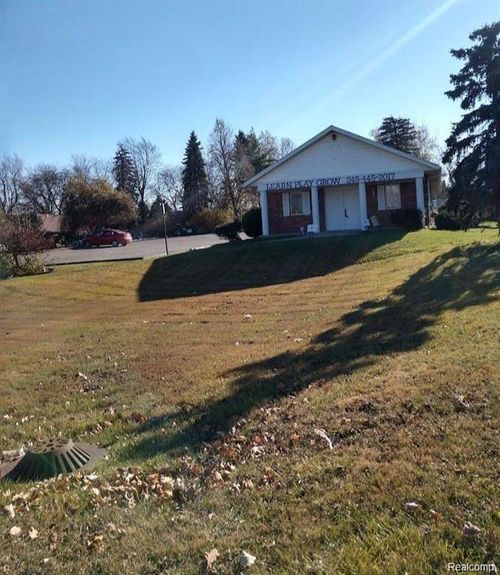 338 E Walton Blvd, Pontiac, MI, 48340-1273 | Card Image