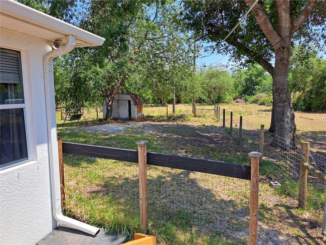 Crossed fenced area just off the back deck. | Image 24