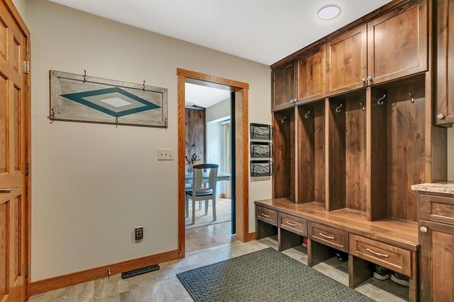 Large mudroom with closet and huge pantry with access to garage | Image 13