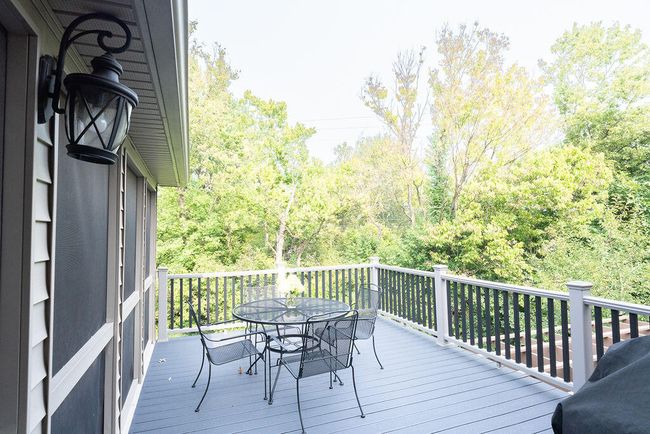 Grilling deck off screened-in porch. | Image 91