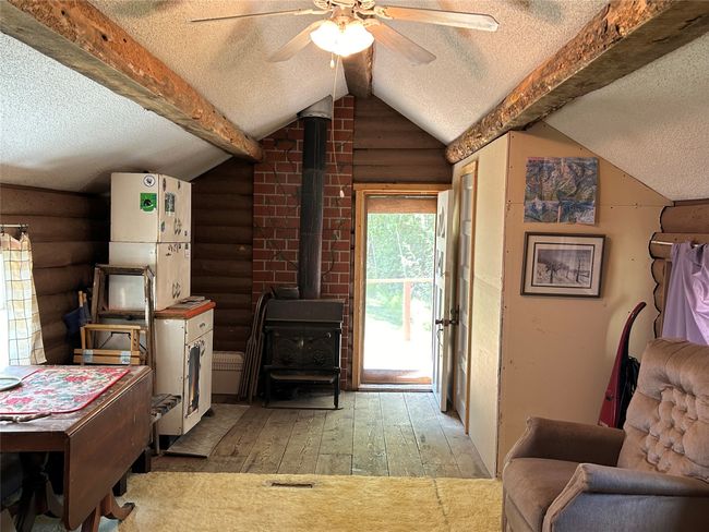 Inside "cabin" looking to door | Image 39