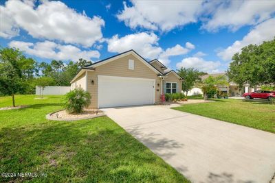 211 Grand Reserve Drive, House other with 3 bedrooms, 2 bathrooms and null parking in Bunnell FL | Image 2