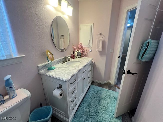 Bathroom featuring vanity and toilet | Image 52