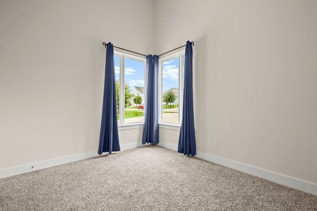 Empty room with light colored carpet and baseboards | Image 9
