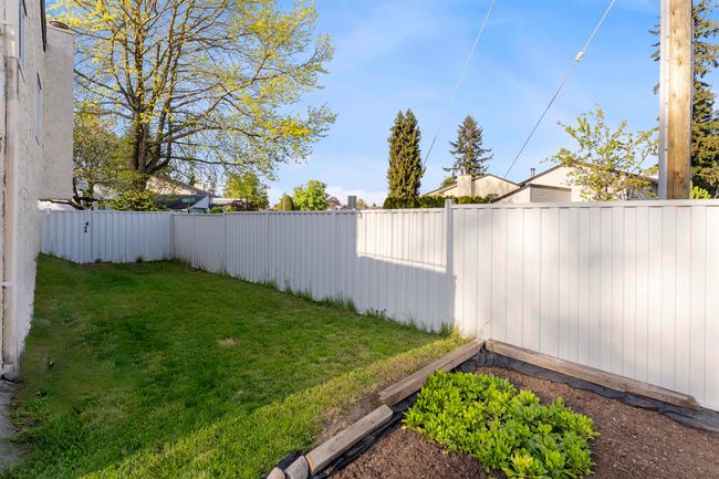 View of yard featuring a fenced backyard | Image 24