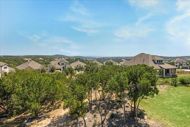 No neighbors directly behind the home and the space will never be built on. | Image 38