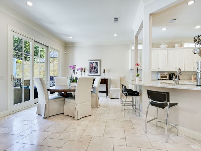 Dining space with crown molding, recessed lighting, and baseboards | Image 10