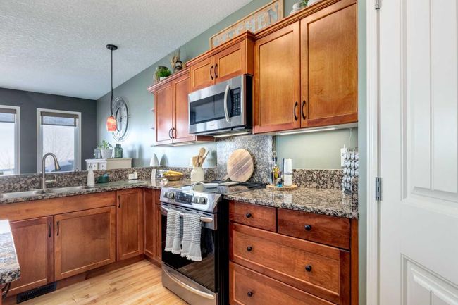 569 Boulder Creek Circle Se, House other with 4 bedrooms, 3 bathrooms and 6 parking in Langdon AB | Image 15