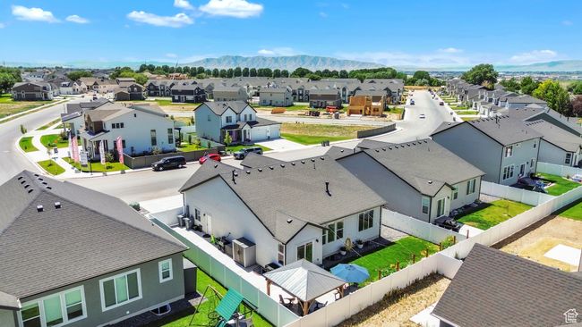 Aerial perspective of suburban area with a mountainous background | Image 36