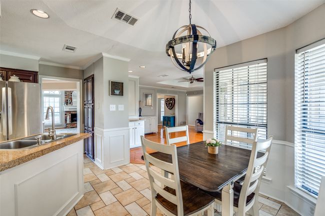 Dining area with a chandelier, crown molding, recessed lighting | Image 17