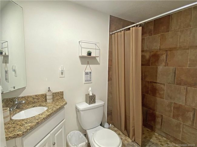 1606 Egret Way, House other with 4 bedrooms, 2 bathrooms and 2 parking in Palm City FL | Image 14
