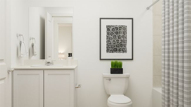 Full bathroom featuring vanity, shower / tub combo, and toilet | Image 12