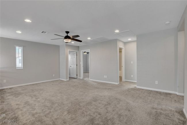 Unfurnished room with recessed lighting, light carpet, ceiling fan, baseboards, and attic access | Image 25