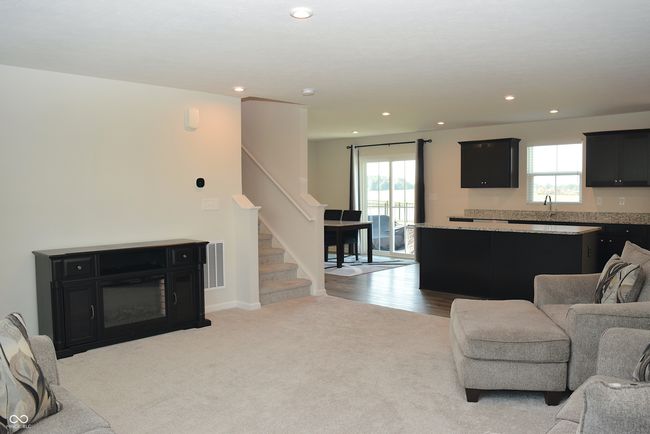 great room open to kitchen and dining area | Image 14