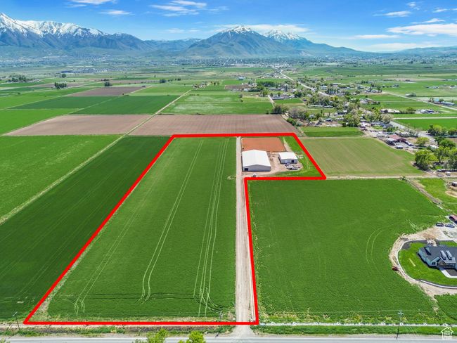 Overview of rural landscape with property parcel outlined and mountains | Image 35