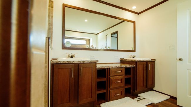 Full bathroom featuring a sink, wood finished floors, ornamental molding, and double vanity | Image 30