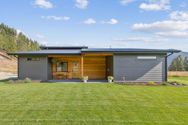 Rear view of property with a lawn | Image 5