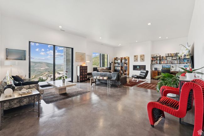 Living area with concrete floors and recessed lighting | Image 52