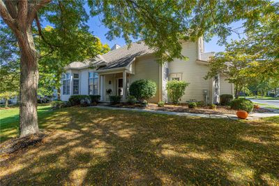 Stately End Unit Townhome in the Deer Run Community | Image 1