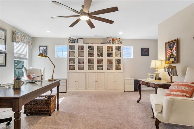 Could be family room, playroom, or home office. | Image 29