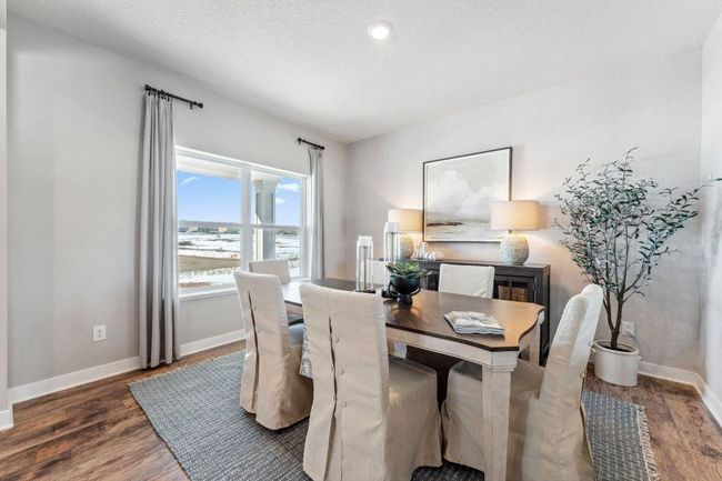 The front flex room on the main level can be used as a formal dining room, home office, music room, hobby room/craft room, library and more! So many possibilities! Photo of Model Home. Options and colors may vary. Ask Sales Agent for details. | Image 13