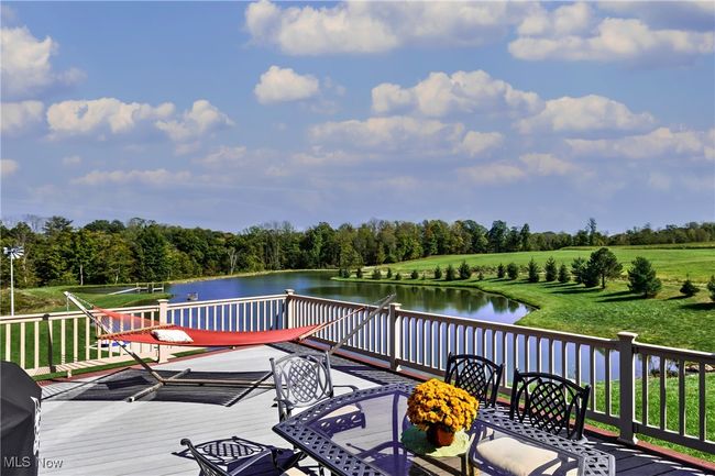 Wooden deck with a water view | Image 9