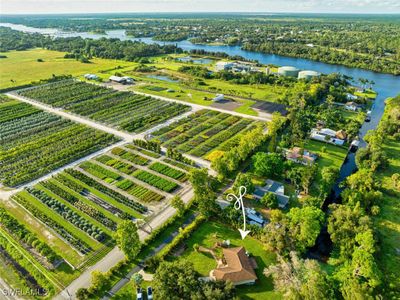 Birds eye view of property featuring a water view and a rural view | Image 1