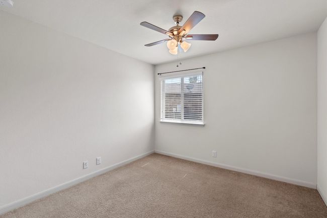 Bedroom 3 carpet flooring and ceiling fan | Image 19