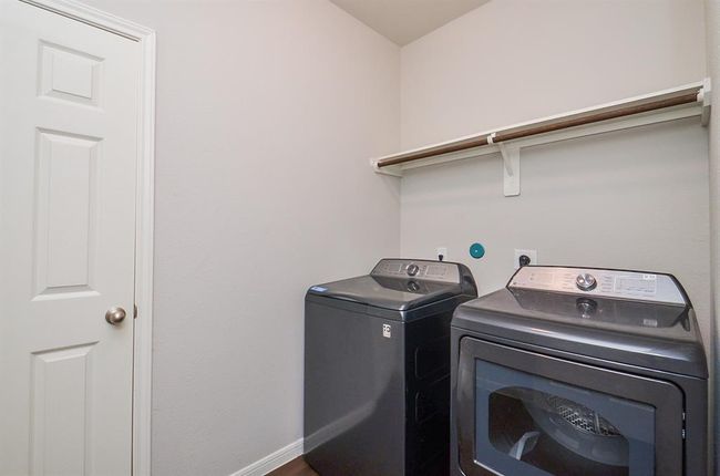 Here's a closer view of the spacious utility room. | Image 26
