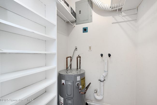 Storage closet off the foyer | Image 13