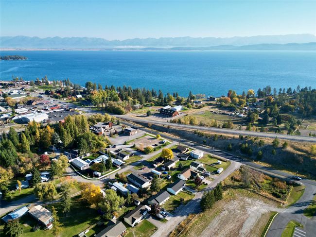 Bird's eye view featuring a water and mountain view | Image 6