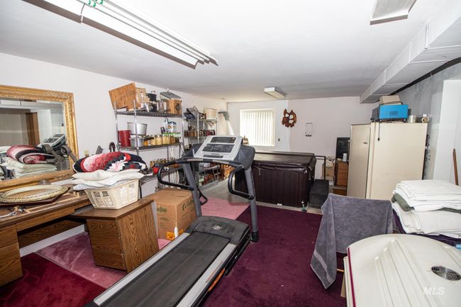 Workout room with carpet | Image 39