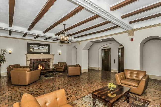 Common area featuring beam ceiling | Image 13